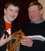 Lewis Young, Handicap Trophy champion, with (right) sponsor Ed Turner